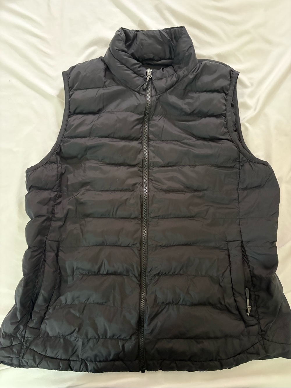 Plain black vest